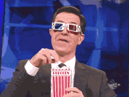 Stephen Colbert eating popcorn