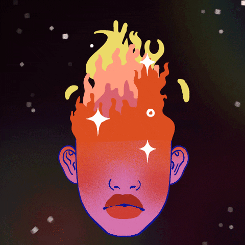 A gif of a purple-ish head with flames covering the top of the head and eyes. The ears, nose and red lips are visible. The face is frowning slightly. 