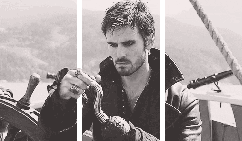 GIF of Colin O'Donoghue playing Killian James, AKA Captain Hook in Once Upon a Time, sharpening his hook. 