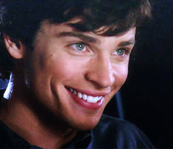 Tom Welling smiling and looking to the side. Tom Welling smiling and looking to the side.