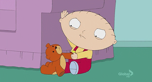 A GIF of Family Guy's Stewie slapping his teddy back and forth