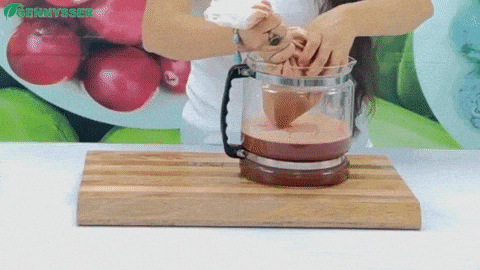 Straining Watermelon Juice with a Nutbag