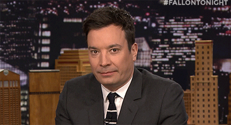Jimmy Fallon gesturing that he is looking at you