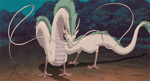 A white and green dragon, Haku from Spirited Away, stands confidently. 