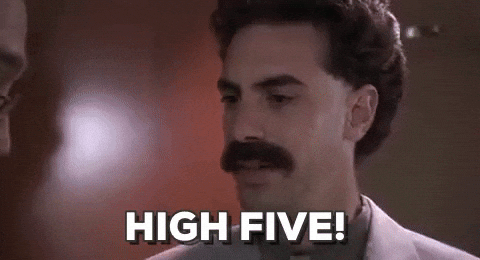 A GIF of a team performing a high five, celebrating their shared success and healthy culture.