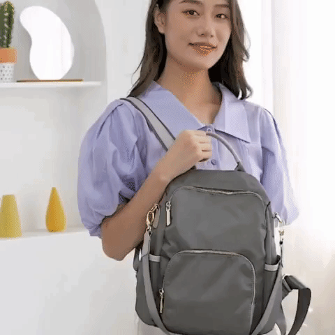 women travel backpack purse in waterproof lightweight nylon with detachable shoulder strap and anti theft back zip pocket