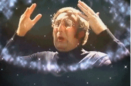 gif featuring a man gesturing that his mind is blown with stars and sparkling lights around