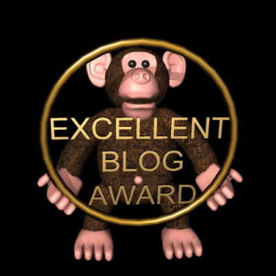 A monkey holds up the Excellent Blog Award.