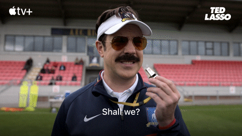 Ted Lasso holding a whistle saying “Shall we?” – used on SOMOS to show how fractional professionals can set their career direction with confidence using goals and time management tools.