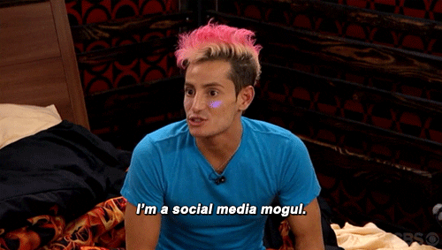 A person with pink hair says, "I'm a social media mogul."