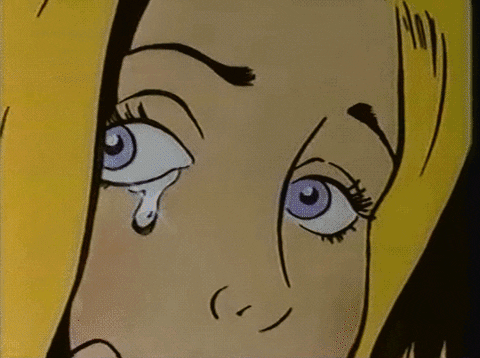A cartoon blond woman points dramatically at the camera while wiping away a tear.