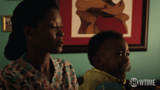 A woman hands a baby to her husband saying, “Pull out next time