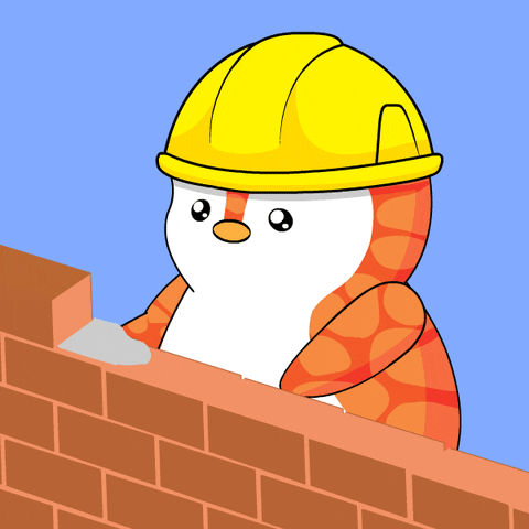 A cartoon penguin in a hard hat building a brick wall. He spreads mortar, then places a new brick on top.