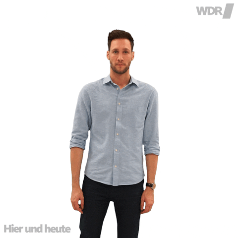 A brown hair Caucasian man pointing up