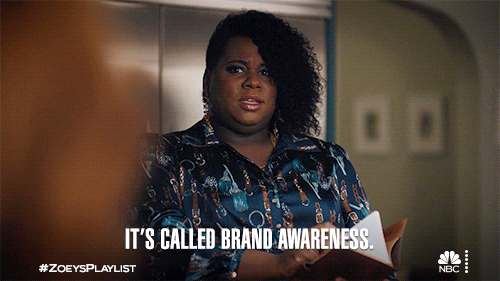 Mo from Zoey’s Extraordinary Playlist saying “It’s called brand awareness” – highlighting how SOMOS helps changemakers build authentic personal brands that attract the right clients and opportunities.