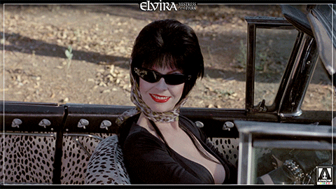 Elvira waving