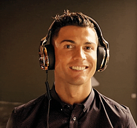 Cristiano Ronaldo listening to headphones Cristiano Ronaldo listening to headphones