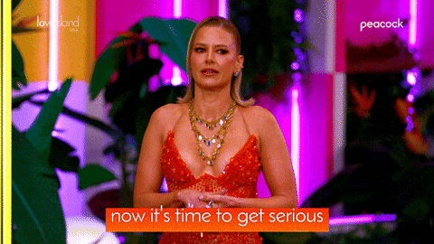 A GIF of the host of Love Island saying "Now it's time to get serious"