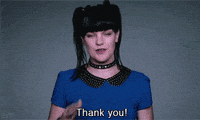 sign language gif showing the sign for thank you