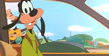 gif of Disney's Goofy nodding as a group of nuns in another car pass by