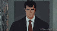 Guts walking to office in a suit