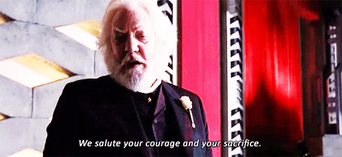 A GIF of President Snow saying "we salute your courage and your sacrifice".
