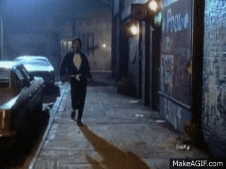 Michael Jackson dancing on the sidewalk