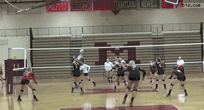 girl playing volleyball split