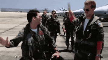 Top Gun: pilots high-fiving on the runway