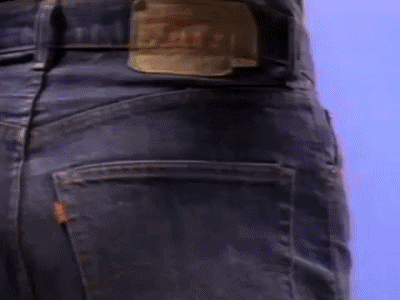 putting comb at the back of the jeans