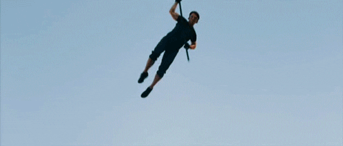Tom Cruise jumping into a building. 
