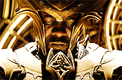 Heimdall in full armor looking up gif