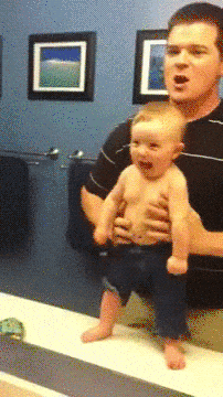 Dad And Baby On Mirror in funny gifs