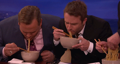 People eating noodles