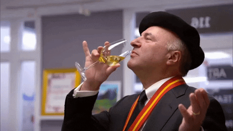 white wine drinking man with a hat gif