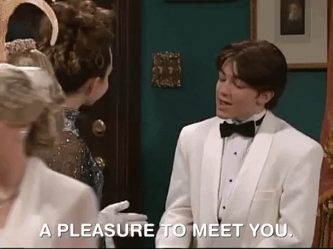 Gif of young actor, Drake Bell, in a suit saying "A pleasure to meet you"
