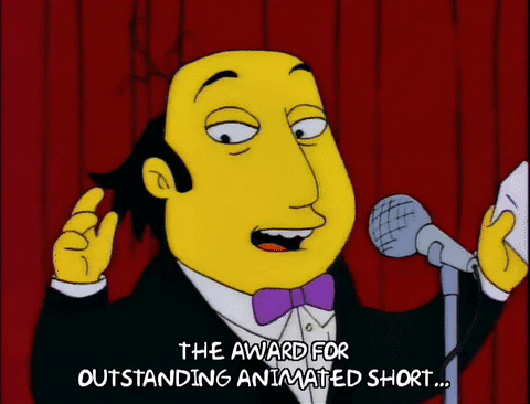 A Simpsons character presenting the award for outstanding animated short