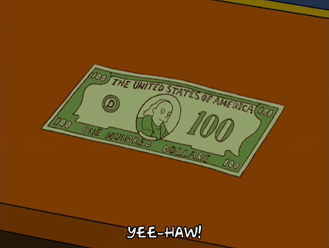 un dólar de los Simpson en la mesa