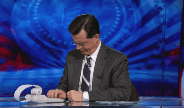 Stephen Colbert Using Calculator GIF
