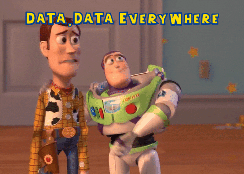 Woody and Buzz stand in Andy's room while Buzz says, "Data, Data Everywhere" in GIF form