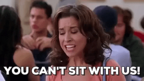 [Image description: GIF of character from Mean Girls saying "you can't sit with us!" Via GIPHY