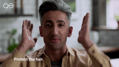 a GIF of Tan France repeating "protect the hair"