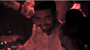 Drake grinning