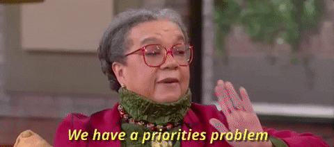 we have a priorities problem gif mature black woman prioritize marketing budget