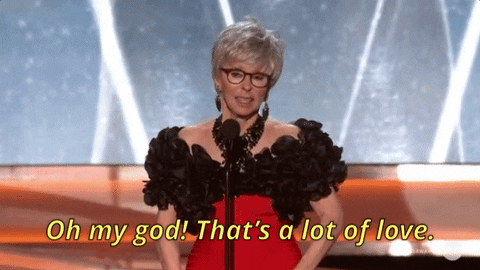 Award ceremony GIF of woman saying "Oh my god! That's a lot of love"