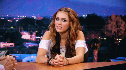 Embarrassed Miley Cyrus GIF - Find & Share on GIPHY