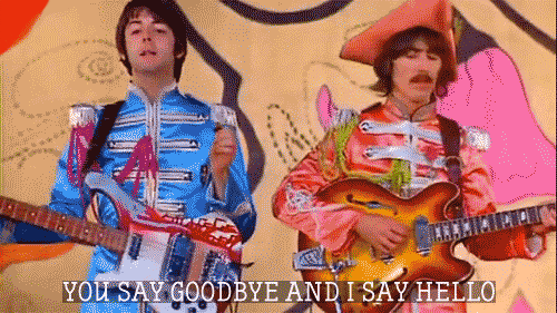 Image of Paul McCartney and George Harrison singing "Hello Goodbye"