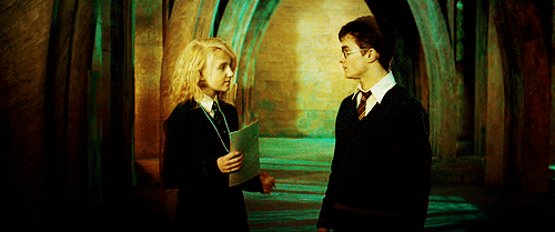 Luna taking Harry's hand