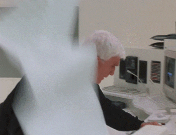 papers flying everywhere gif