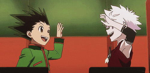 Gon and Killua, character from Hunter x Hunter, doing high five while smiling, congratulating them selfs.